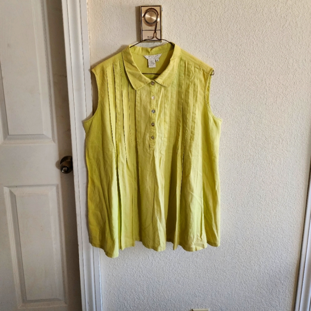 A Sandro, sportswear,  size XL blouse.  Color is a light line green.